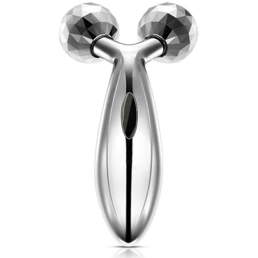 Silver facial roller with two round ends on a white background