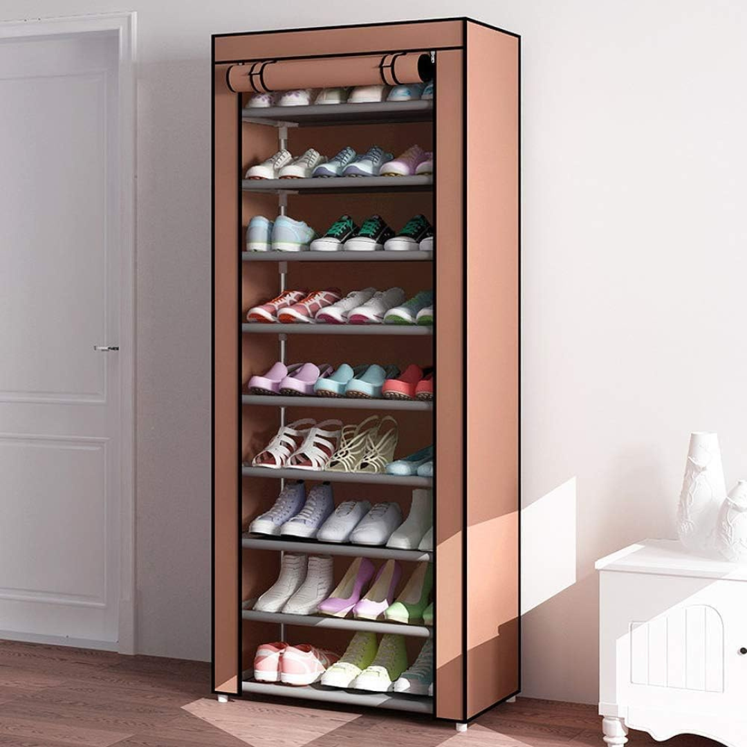 Brown shoe cabinet with multiple shelves filled with shoes in a room.