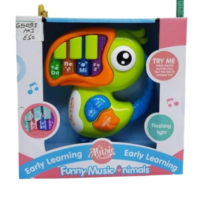 Toy piano shaped like a fish in its packaging with colorful design elements.