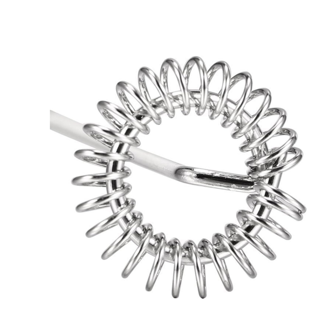 Silver coil spring on a white background