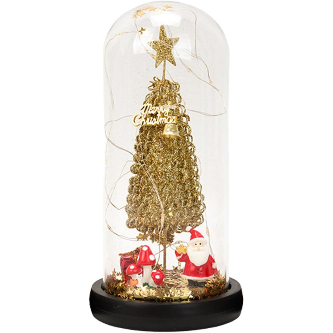 Decorative Christmas scene with a gold tree, Santa Claus, and presents under a glass dome on a white background.
