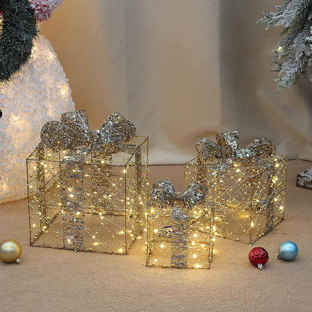 Decorative Christmas presents with lights and ornaments on a neutral background