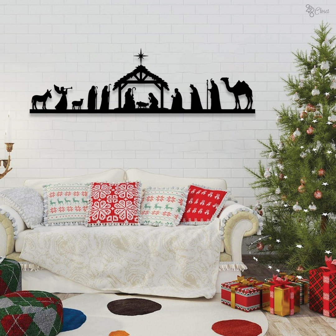 Nativity scene wall art in a living room with Christmas tree and presents.