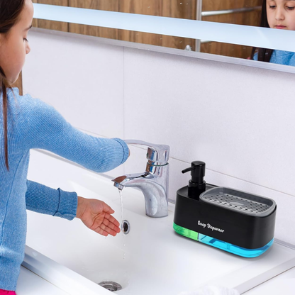 Child washing hands with soap dispenser next to a sink