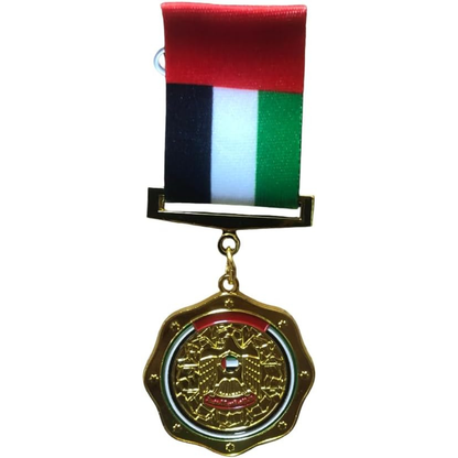 UAE National Day Flag Pin Badge with Gold-Plated Falcon Medallion - UAE National Day Flag Brooch with Gold-Plated Falcon Medallion.