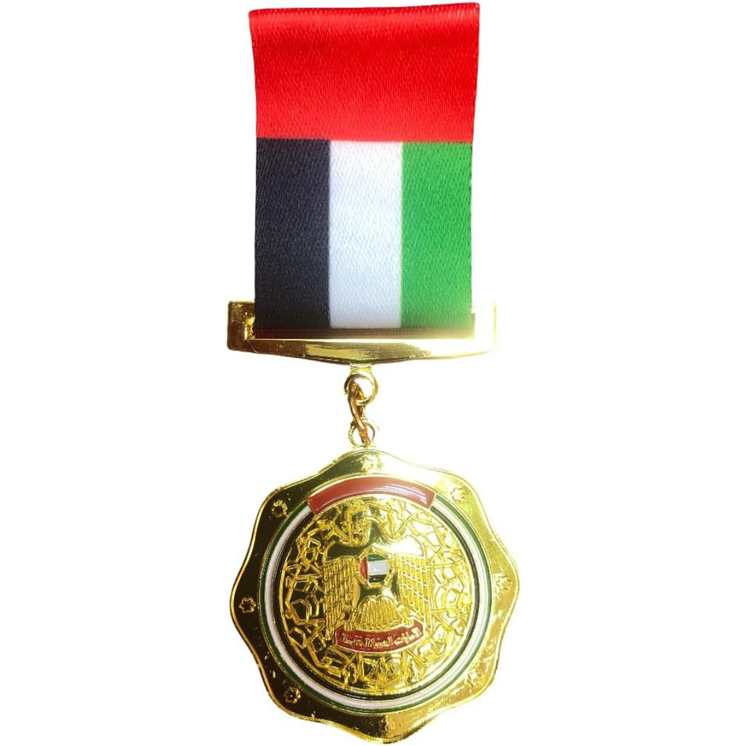 Gold medal with a red, white, and green ribbon on a white background