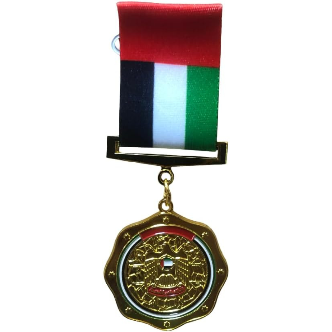 UAE National Day Flag Pin Badge with Gold-Plated Falcon Medallion - UAE National Day Flag Brooch with Gold-Plated Falcon Medallion.